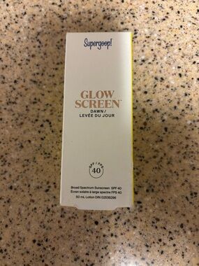 Supergoop! Yellow and White Sunscreen Box Top View